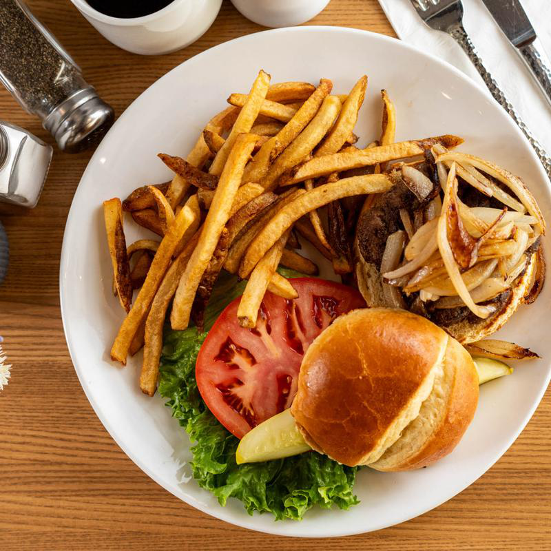 House burger with golden fries at 5800 North Cafe