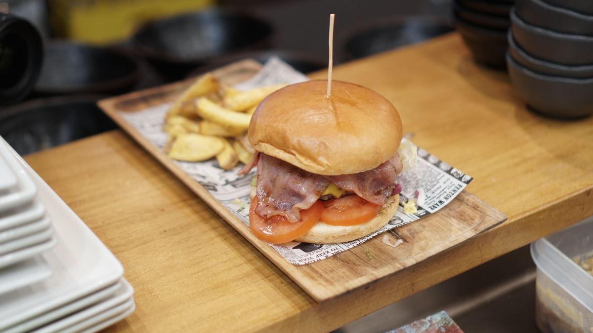 A classic burger and fries served warm