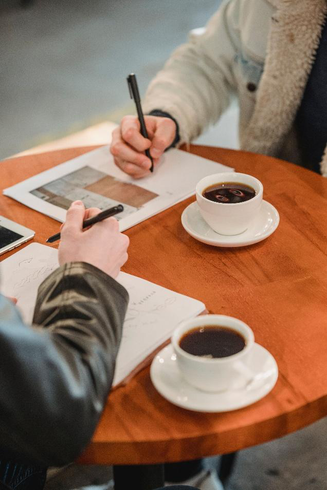 People having a business meeting in a café