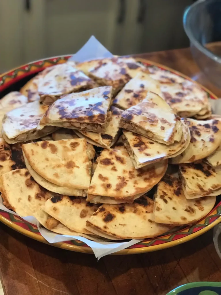 Plate of sliced quesadillas.
